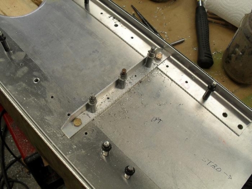 pilot rivet holes in upright drilled