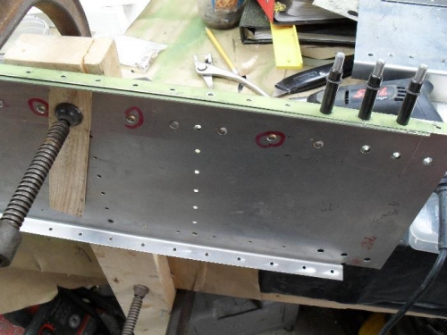 rivet holes being drilled
