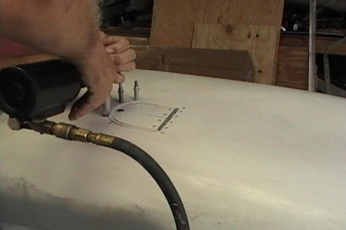 Clecoing and riveting the backing plate and door