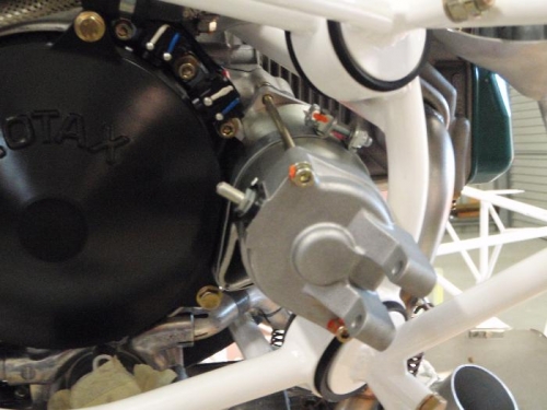 engine starter motor attach clamp repositioned