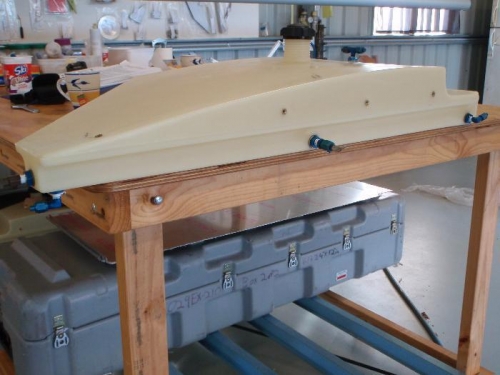 Tank fittings drilled and leak check being carried out