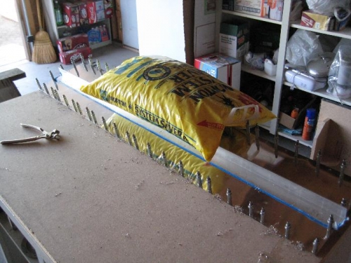 Bags of salt on aluminum angle to make the aileron stright