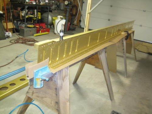 Door vise on the sawhorse holds the spar upright