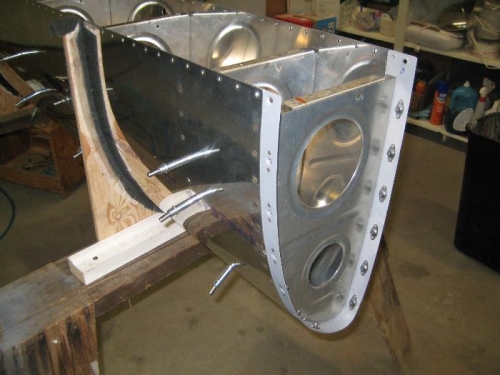 Right leading edge with splice strip riveted