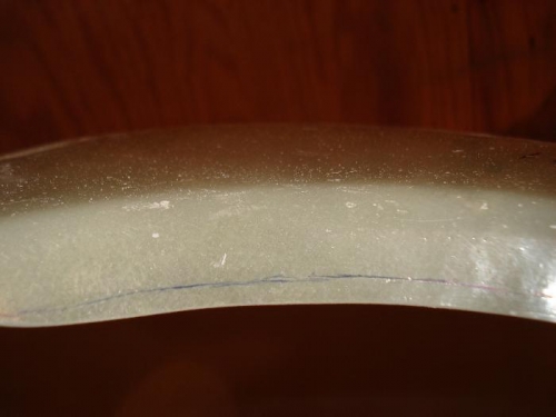 Scribe line on lower cowl prop opening.