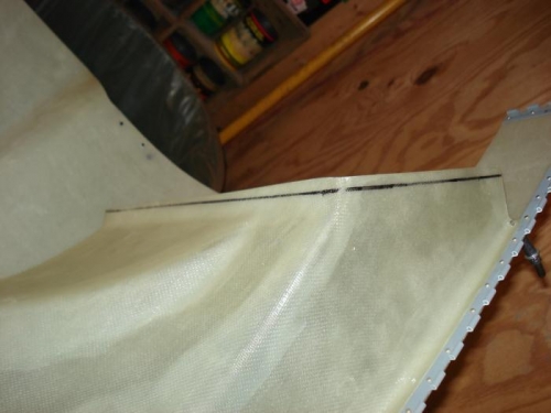 Duct marked for trimming at interface opening.