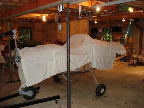 Repositioned with tail in shop.