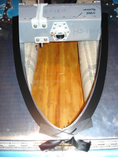 Lower stab skin marked for trimming.