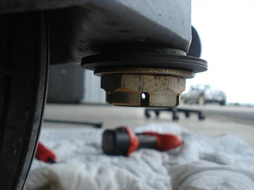 Tension adjusting nut, pin removed.