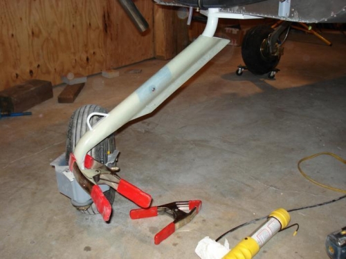 Fitting the nose leg fairing.