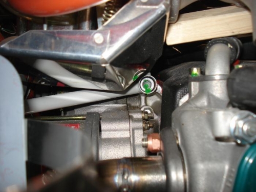 Upper right capscrew torqued and  marked.