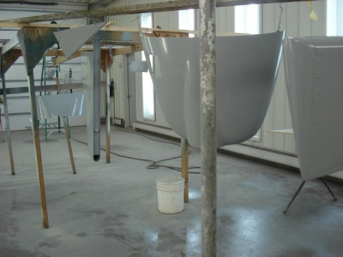 Parts hanging with primer.