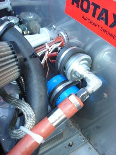 Capacitor mounted below fuel sensor.