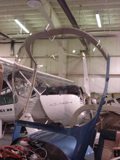 Looking through the window glass.