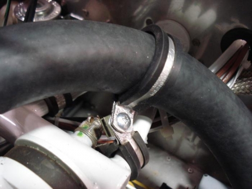 Stand-off adels for coolant hose.