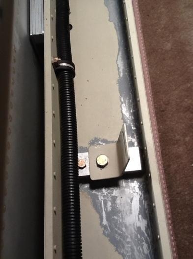 Old conduit blocking gear bolts.