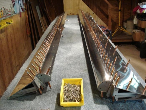 Twin flaperons awaiting riveting.