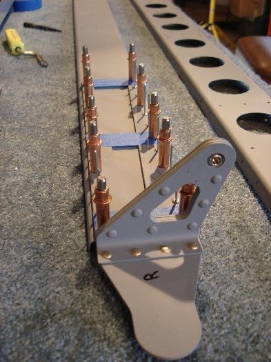 Assembling rear spar with flaperon hinge.
