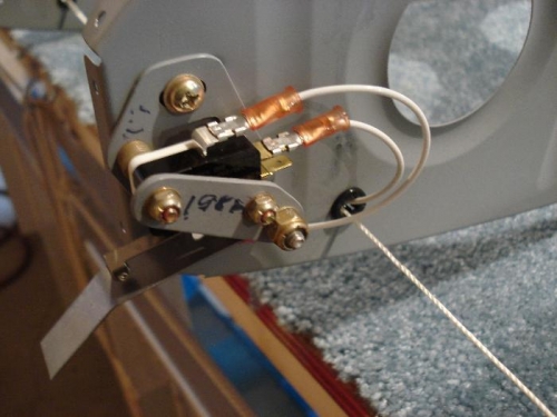 Stall warning mechanism mounted in wing.