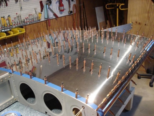 Inboard bottom skin ready to rivet.