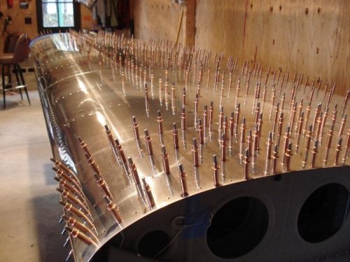 Right wing awaiting riveting.