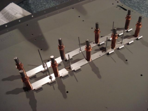 Seat back hinges ready to rivet.