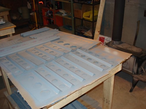 Seat back parts ready for assembly.