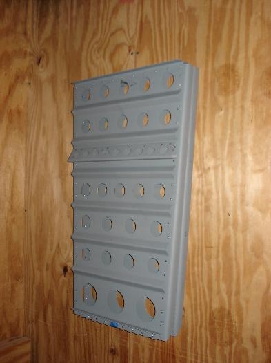 Seat backs on the wall.