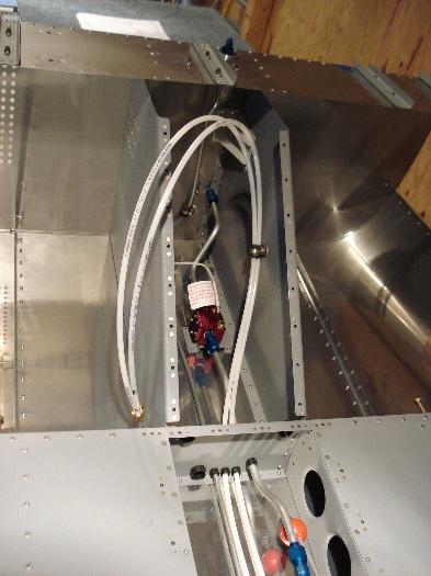 Brake lines in tunnel.