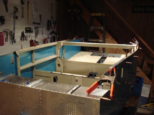 Longerons clamped for drilling.