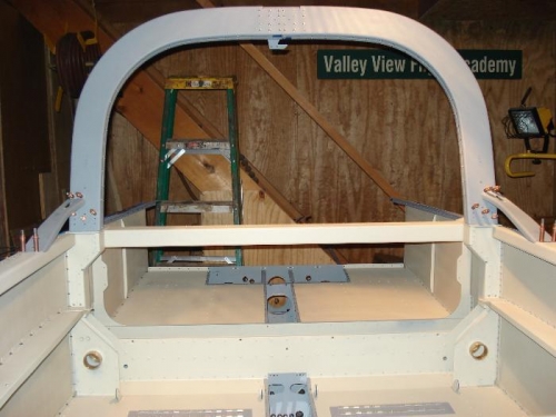 Inside of boat with roll bar.