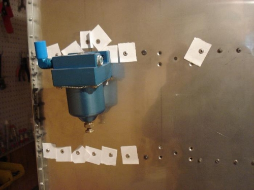 Label masks over rivets.