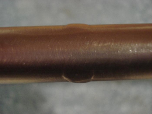 Canopy frame bow weld smoothed.