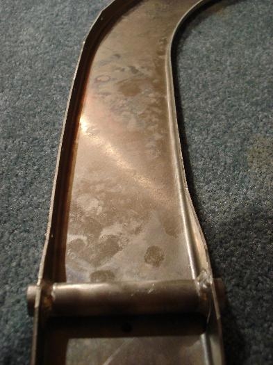 Aft canopy frame rough edges.