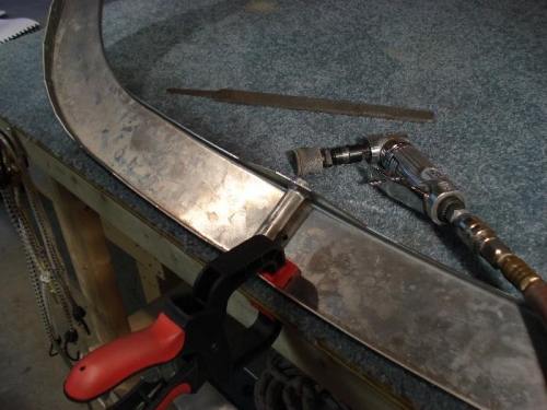 Deburring canopy frame.