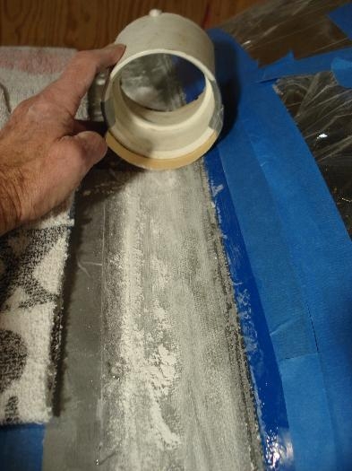 Curved sanding tool.