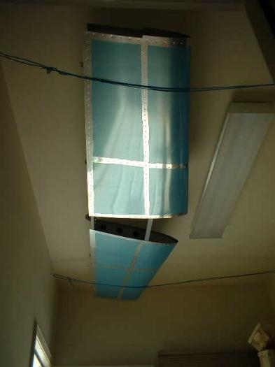 Horizontal Stabilizer suspended from backroom ceiling