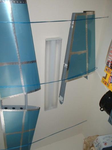 Horizontal and Vertical stabilizers hanging from the ceiling