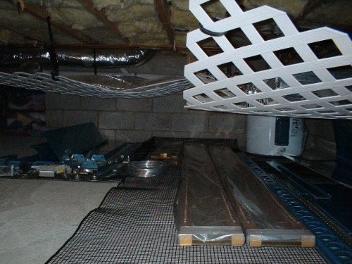 Wing parts tucked away in crawl space