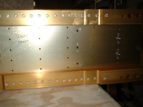 Front view of Z-Bracket nutplates riveted to spar