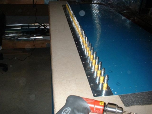 Top tank skin countersunk for baffle; #19 holes drilled for spar