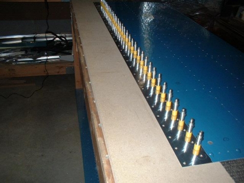 Bot tank skin countersunk for baffle; #19 holes drilled for spar