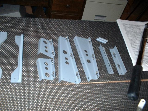 Nutplates riveted to stiffeners and cover brackets