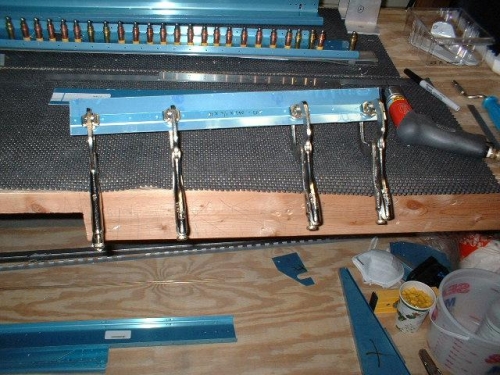 The shims were then used to drill the top plates with the bend