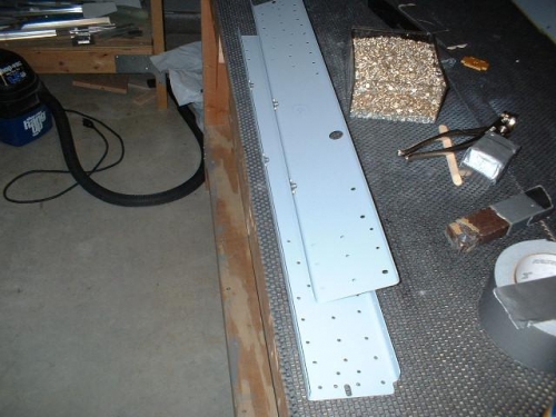 Nutplates riveted to F705 side channels