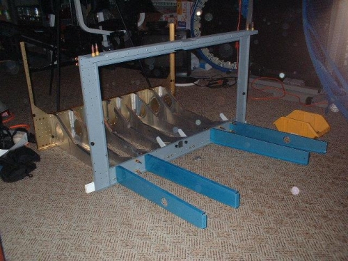 Seat and baggage ribs clecoed to F704 and F705 bulkheads