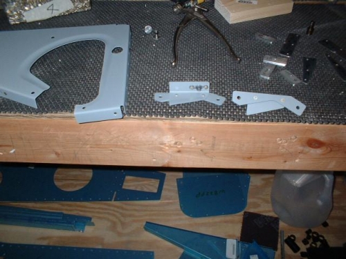 Rivet access plates for seat ribs and rivet nutplates