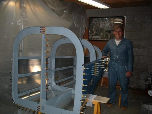 And a picture of me with the riveted aft section as well
