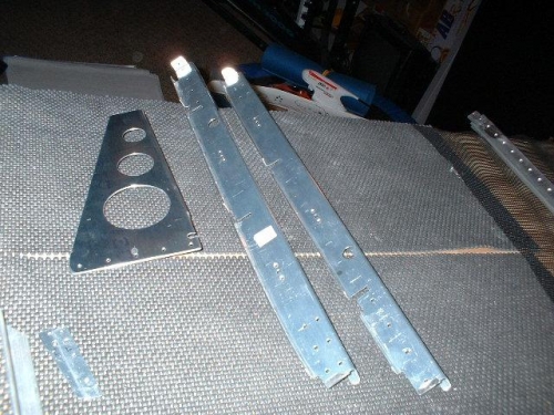Lightening holes, nutplate holes, rudder cable holes