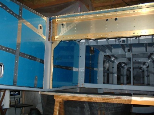 Inside view of left side skin clecoed to fuselage